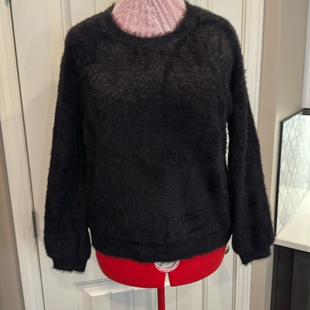 INC fuzzy black sweater.